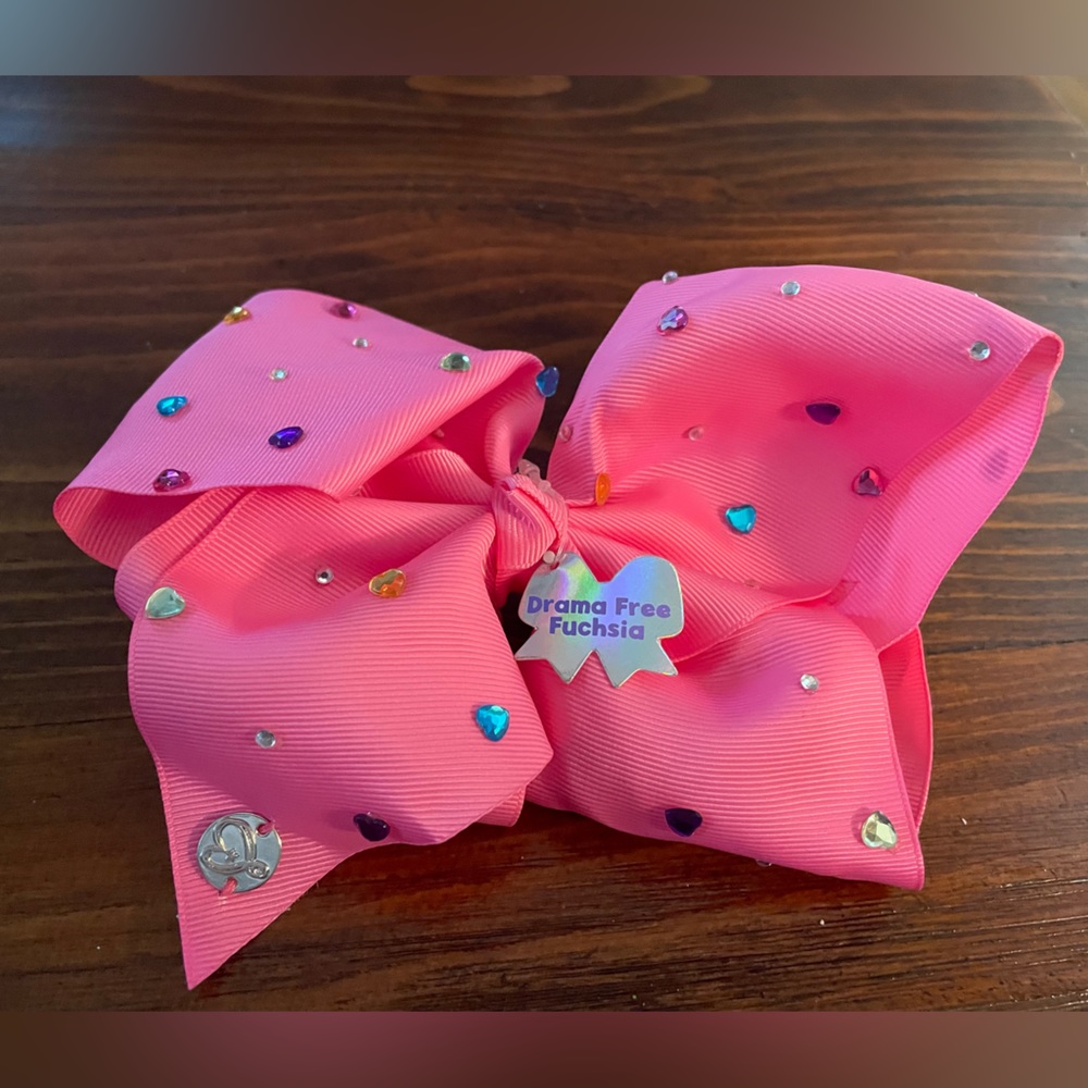 Jojo Siwa signature collection Drama Free Fuscia large hair bow clip.